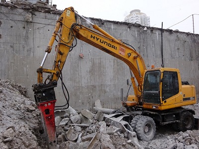 Колісний екскаватор з гідромолотом 18 тонн